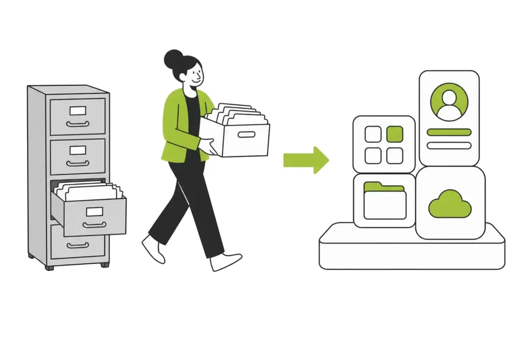 A consultant carries records from an old filing cabinet to a modern platform