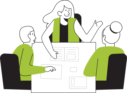 Three people around a work table, content plans spread out in front of them